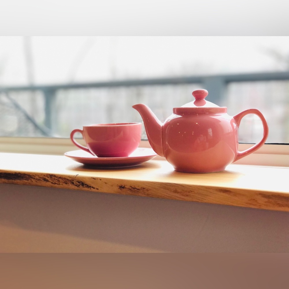 Old Amsterdam Porcelain pink teapot with matching teacup and plate.